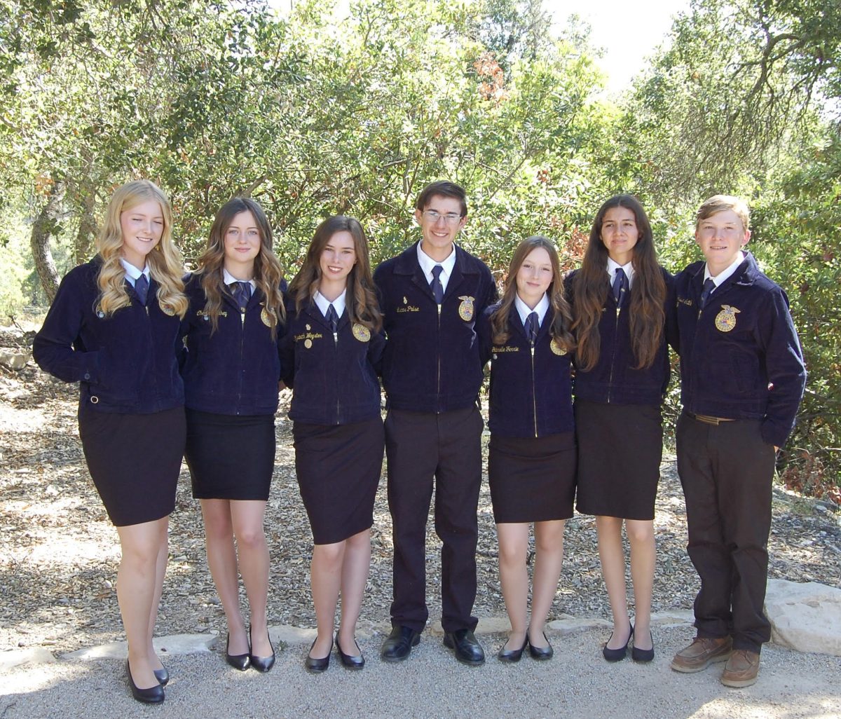 The 2024-2025 Officer team posing in uniform (from left to right: Maddie Mckee, Cherish Cathey, Elizabeth Wagster, Lucas Pulse, Gabby Ferrie, Analisa Jorgensen, Jesse Smith) 